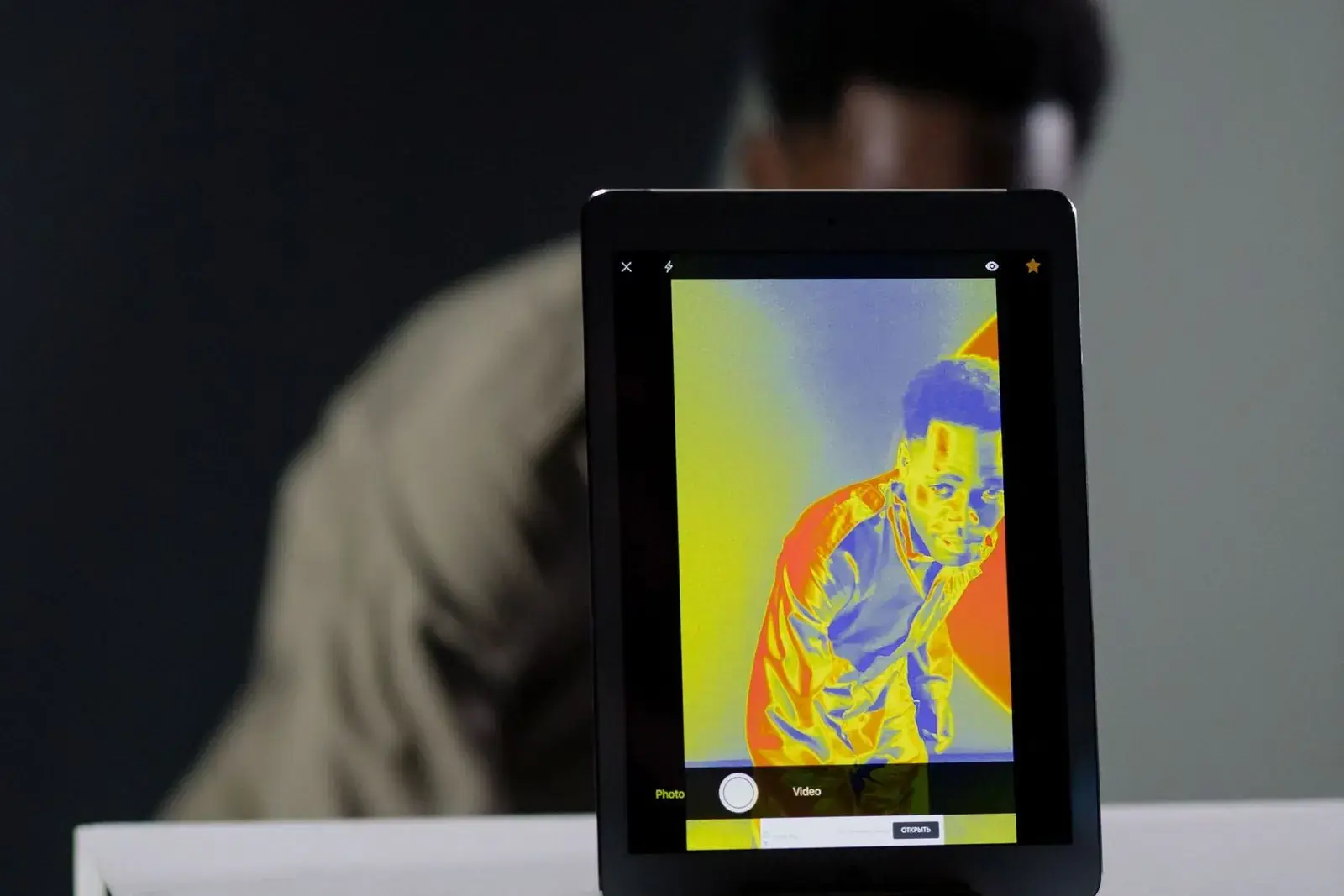 Tablet showing a thermal image taken with an infrared camera